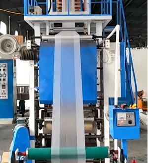 Low pressure belt printing film blowing machine